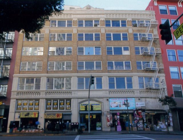Before: Front facade of the Grether & Grether Building before rehabilitation.